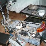 Honda Motocompo desmontada para revisión de óxido y corrosión